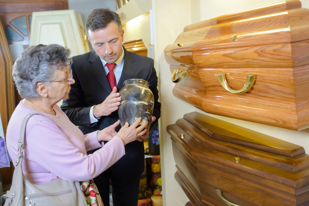 Mother choosing either cremation or burial