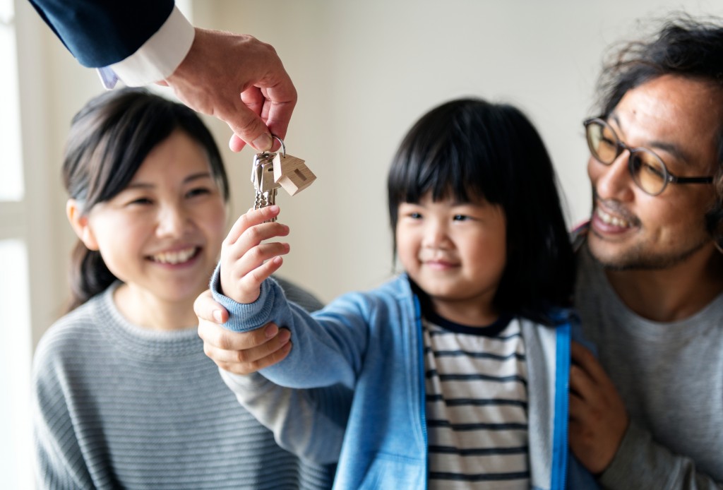 asian family getting a new house