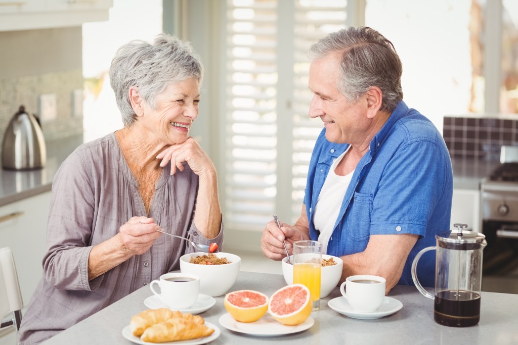 old couple having breakfast