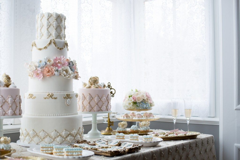 wedding cake and dessert buffet set-up