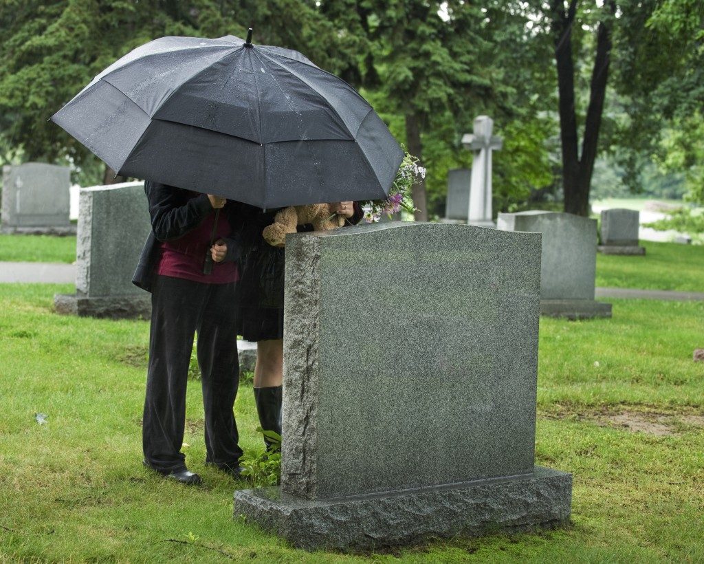 visiting at the cemetery