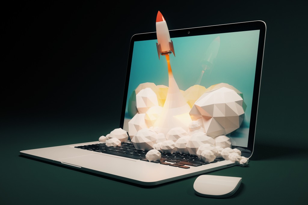 visual design of a miniature rocket blasting off from a laptop screen