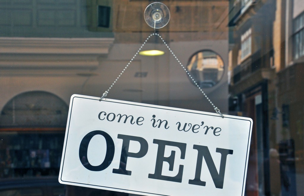 open sign in a bar