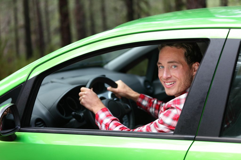 man driving an electric car